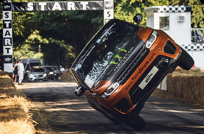 UP WE GO! Terry Grant and is tweaked Land Rover Sport take off from the start of the hillclimb. Image: Land Rover